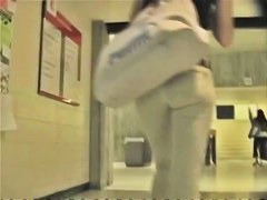 A brunette with appetizing ass in the street candid video