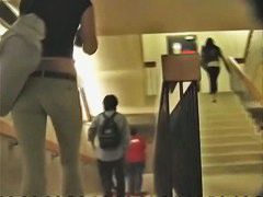 A brunette with appetizing ass in the street candid video