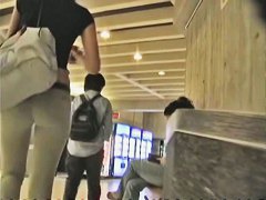 A brunette with appetizing ass in the street candid video