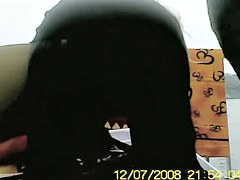 Amateur bends over showing black pantyhose upskirt