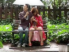 Asian babe in kimono enjoys the outdoors