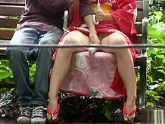Asian babe in kimono enjoys the outdoors