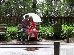 Asian babe in kimono enjoys the outdoors