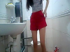 Asian student 18+ taking a pee in the college WC