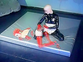 Bald Latex Fisting