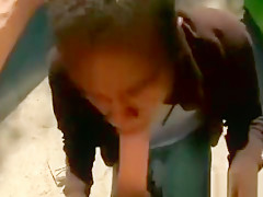 Black gang dude gives white guy head and ass