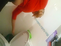 Blonde milf peeing at home