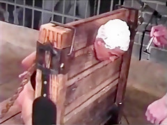 Bound slave shaved bald