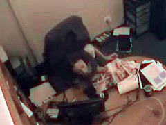 Brunette dildo fucks pussy in the office chair in vid