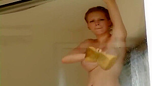 Busty German Cleans Window With Her Tits