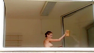 Busty German Cleans Window With Her Tits
