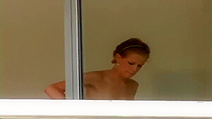 Busty German Cleans Window With Her Tits