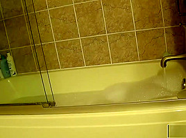 Busty Romi Rain Plays Around While Bathing