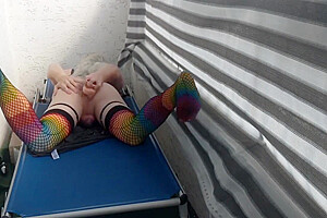 Caged Sissy Plays With Her Dildo On Public Balcony