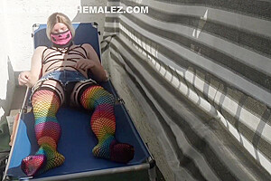 Caged Sissy Plays With Her Dildo On Public Balcony