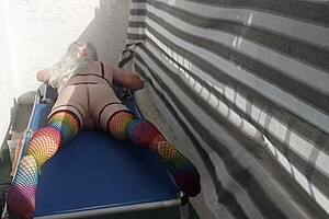 Caged Sissy Plays With Her Dildo On Public Balcony