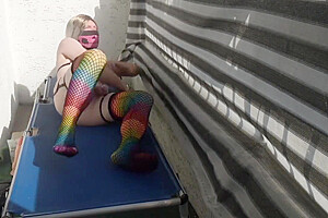 Caged Sissy Plays With Her Dildo On Public Balcony