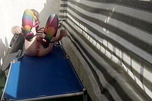 Caged Sissy Plays With Her Dildo On Public Balcony