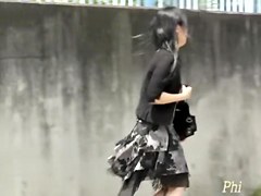 Classy lady waits for her cab and gets skirt sharked