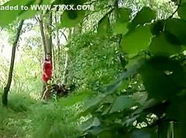 Claudia Rossi Takes A Walk In The Woods Wearing A Dress
