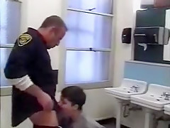 Cop fucks prisioner