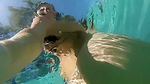 Curvy Alison swims and masturbates in the pool