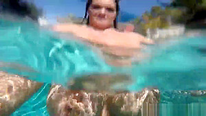 Curvy Alison swims and masturbates in the pool