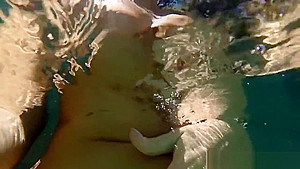 Curvy Alison swims and masturbates in the pool