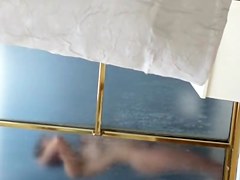 Dark haired girl in the shower sexy naked body view