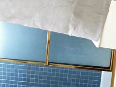 Dark haired girl in the shower sexy naked body view