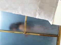 Dark haired girl in the shower sexy naked body view