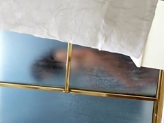 Dark haired girl in the shower sexy naked body view