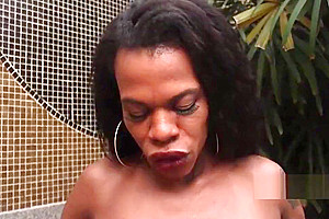 Ebony shemale slut cummed solo by the pool