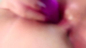 Fat slut toys her pussy