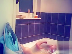 Foxy blonde with perky tits enjoys masterbating in the bathroom