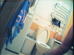 Girl in polka dot dress upskirt masturbation in toilet