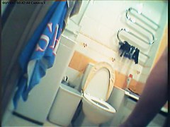 Girl in polka dot dress upskirt masturbation in toilet
