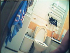Girl in polka dot dress upskirt masturbation in toilet