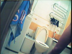Girl in polka dot dress upskirt masturbation in toilet