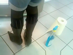 Girl in shorts cleanig glass