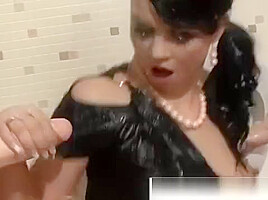 Gloryhole fake cock gets babe wet and messy