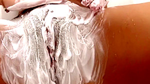 Horny brunette with a sweet ass shaves her pussy and then masturbates