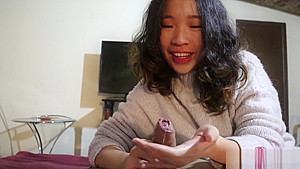 Hot Chinese girlfriend gives an oiled handjob POV