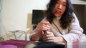 Hot Chinese girlfriend gives an oiled handjob POV
