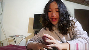 Hot Chinese girlfriend gives an oiled handjob POV
