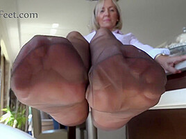 Hot Milf In Pantyhose Footjob Video