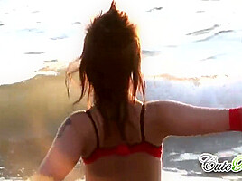 Hot babes on the beach teasing the camera