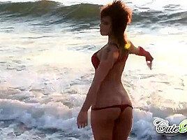 Hot babes on the beach teasing the camera
