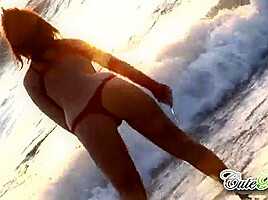 Hot babes on the beach teasing the camera