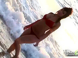 Hot babes on the beach teasing the camera